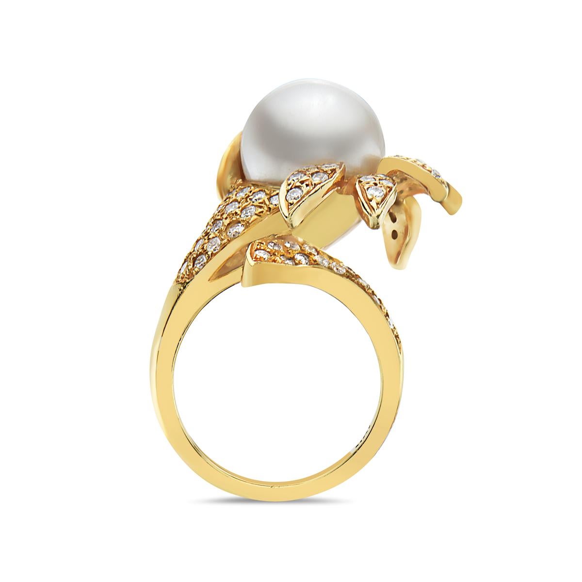 This cascading flower cocktail ring features a 12mm pearl and 1.40 carats of G VS diamonds set in 18K yellow gold. 16.3 grams. Made in Italy.

Viewings available in our NYC showroom by appointment.