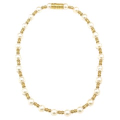 Collana di perle in oro giallo 18k