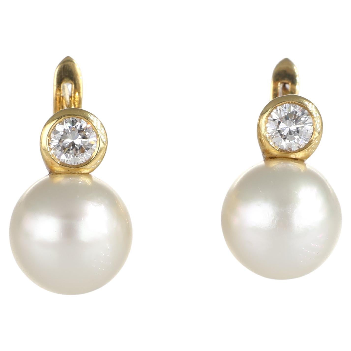 Pendientes de oro amarillo de 18 quilates con perlas y diamantes