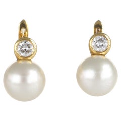 Pendientes de oro amarillo de 18 quilates con perlas y diamantes