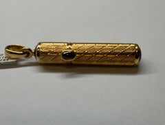 Pendentif flacon de parfum en or jaune 18 carats avec cabochon rouge