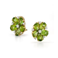 Orecchini a grappolo con peridoto e diamanti in oro giallo 18K