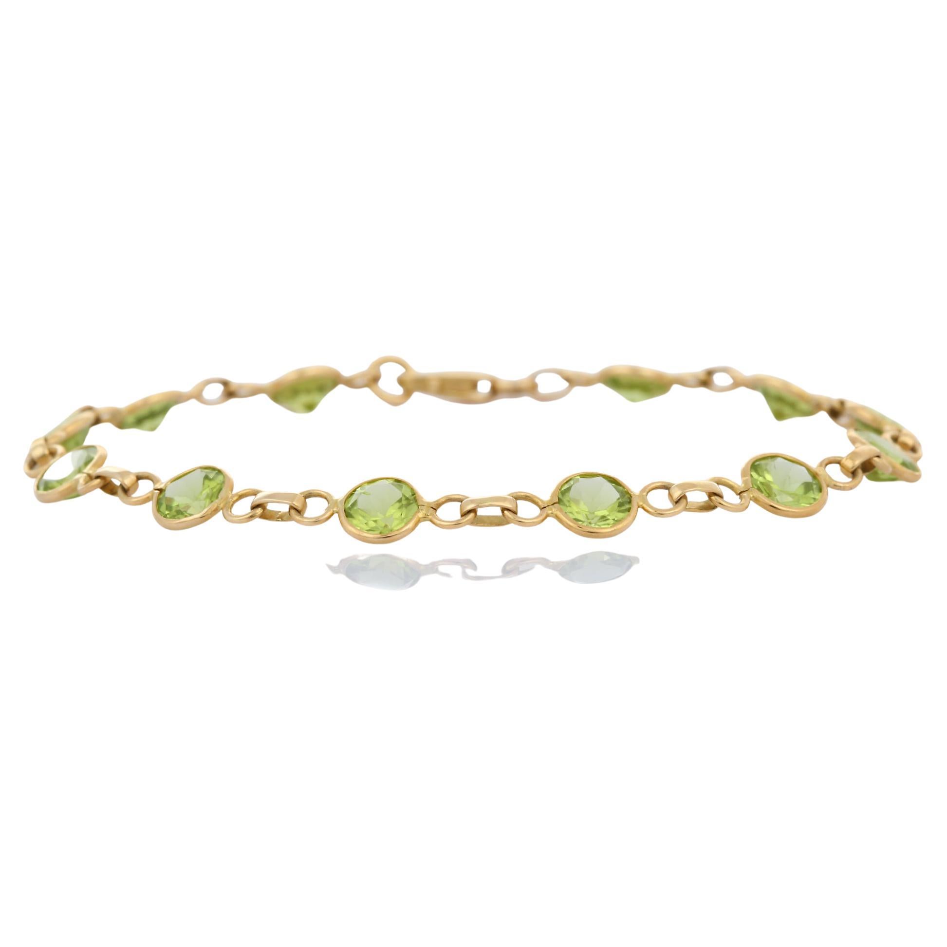 This Peridot Linking Chain Bracelet in 18K gold showcases 12 endlessly sparkling natural peridot, weighing 5.85 carats. It measures 7 inches long in length. 
Peridot attracts love and calms anger by giving renewal to all things.
Designed with twelve
