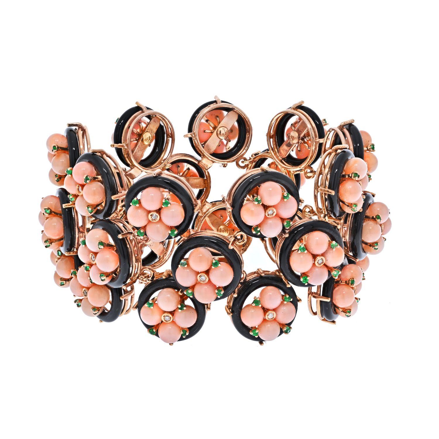 With over 60 shades of coral you will be delighted to see this genuine baby pink coral bracelet. It is fashioned in a link style sectional and is quite wide: about 2 inches. The bracelet is desinged in a multi-row station fashion and features coral