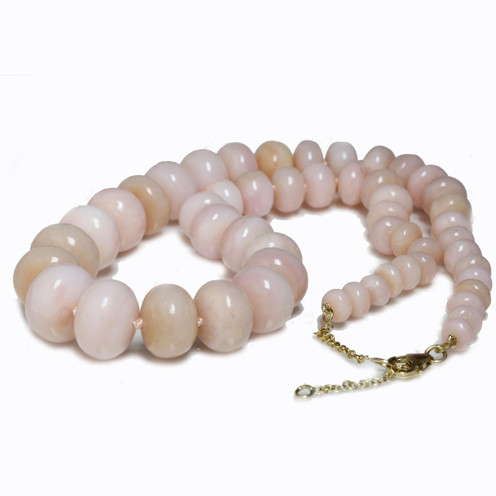 Add a gorgeous dash of color to your neckline with these stunning genuine Pink Opal beads. A unique statement piece, but also versatile enough to wear with almost anything.  The necklace is rare size and graduate from 15.5 - 6.5mm hand knotted with