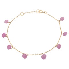 Kette und Tropfenarmband aus 18K Gelbgold mit rosa Saphiren