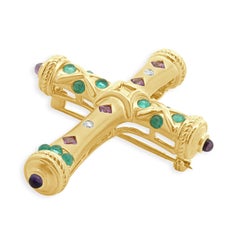 Croce in oro giallo 18 carati con zaffiro rosa, tormalina Paraiba, diamanti e ametista.