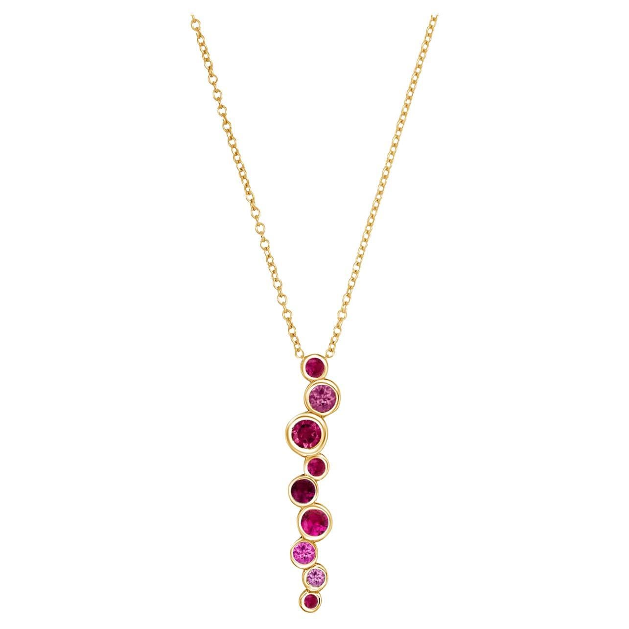 Colgante largo en cascada de zafiro rosa y rubí en oro amarillo de 18k