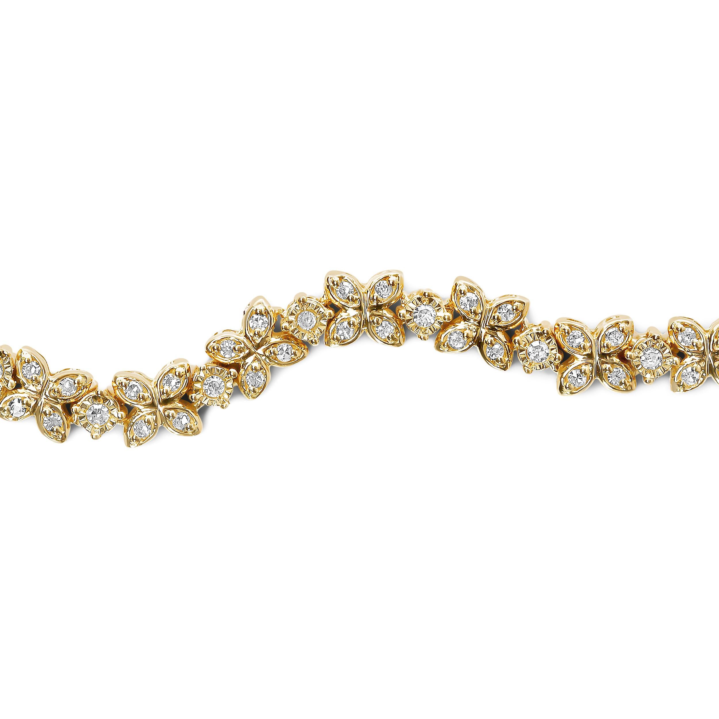 Indulge in the ultimate luxury with this stunning 18K yellow gold plated .925 sterling silver bolo bracelet, adorned with 34 round diamonds totaling 1/4 cttw. The natural diamonds have an I-J color and I1-I2 clarity, perfectly set in both prong and