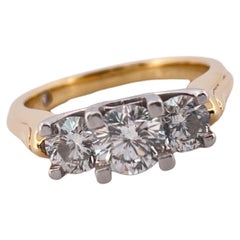 Anello con tre pietre in oro giallo 18k e platino con diamanti 1,49ctw G-H SI1