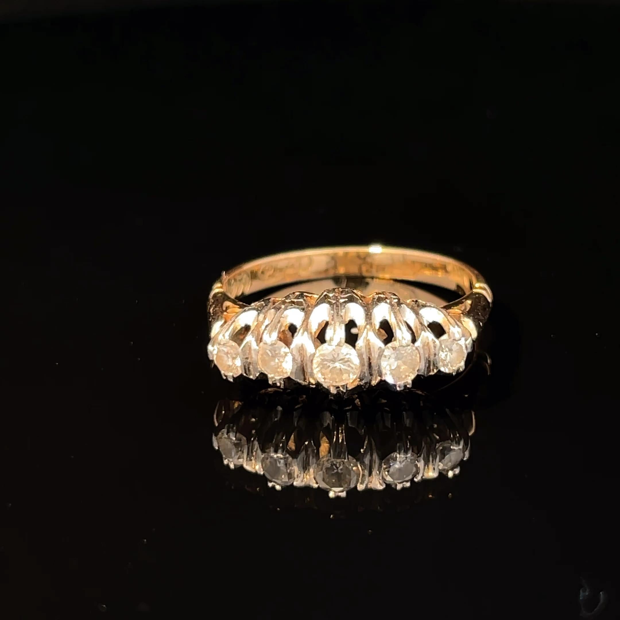Elevate your elegance with this stunning five-stone diamond ring, a true masterpiece crafted to perfection. Set in a luxurious combination of 18k yellow gold and platinum, this ring not only showcases the brilliance of each diamond but also offers a