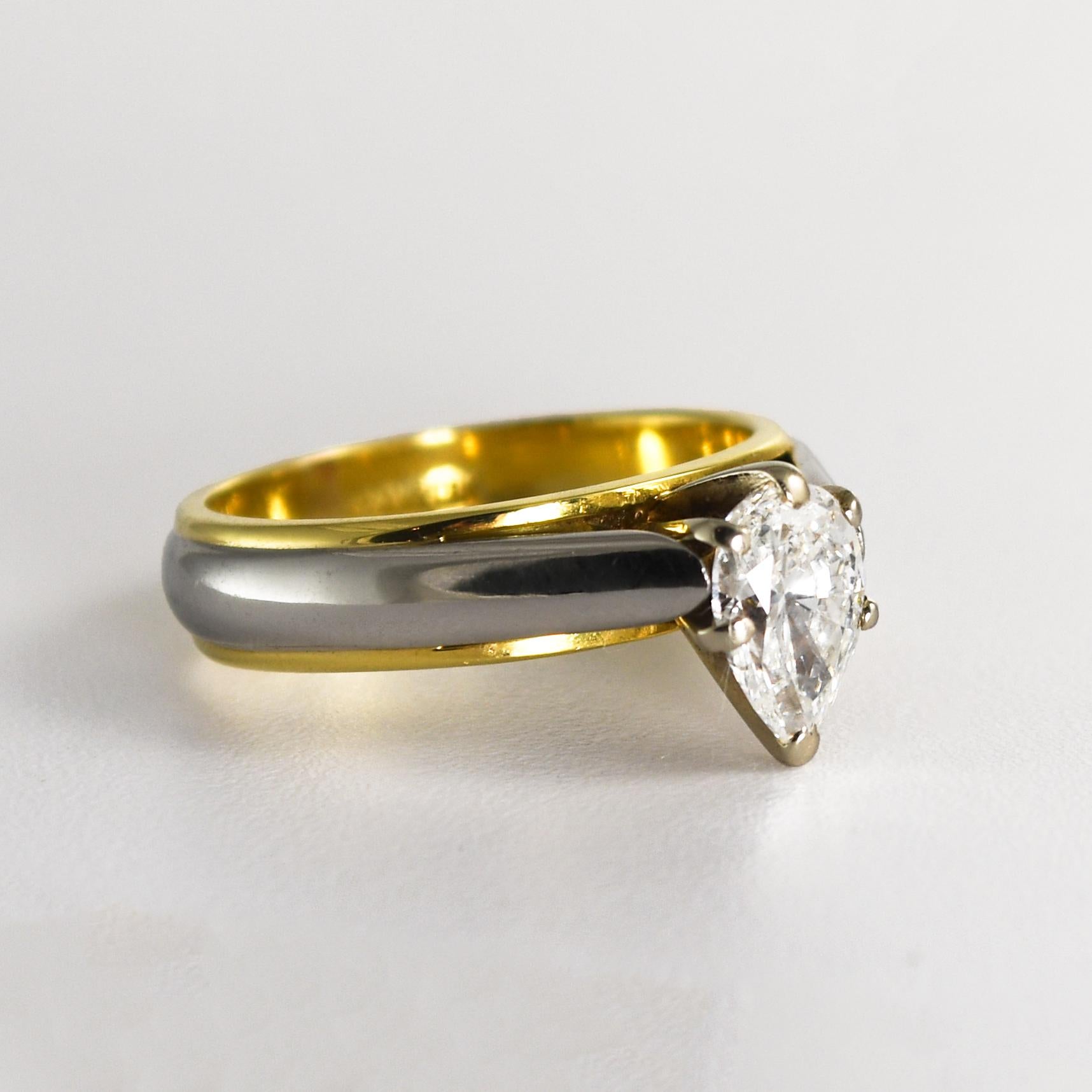Ladies' pear shape diamond solitaire ring in 18k yellow gold and platinum.
Stamped Plat& 18k and weighs 7.4 grams.
The pear-shaped diamond is H color, Si2 clarity, and very good cut, 1.01 carats. Comes with EGL Mini cert 
The ring size is 7 and can