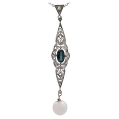 Collier en or jaune 18 carats et platine, serti de saphirs, de diamants et d'une perle naturelle