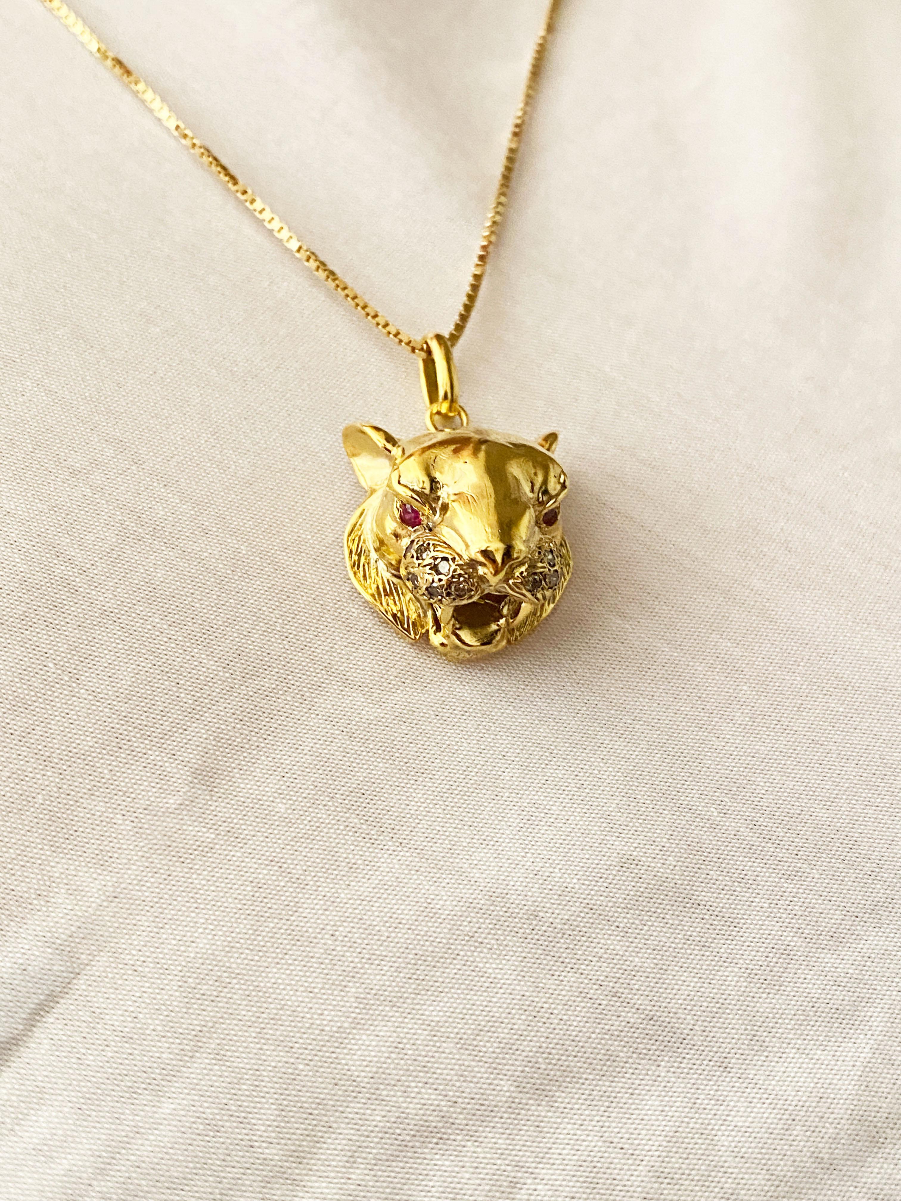 Introducing the highly sought-after Rossella Ugolini handcrafted unisex unique tiger pendant, a true masterpiece of artistry and luxury. This exceptional pendant is crafted from 18K yellow gold, meticulously sculpted by skilled artisans in Italy