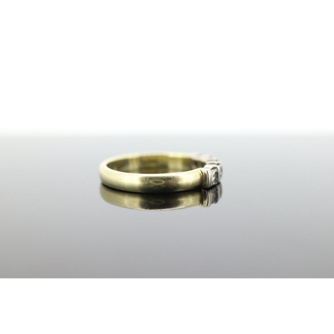 Vintage from the 1990s
Size: 7 US
Materials: Gold
Gemstone: Diamond

Band color: Gold

Beautiful Princess cut diamond half eternity band. Very slick but defiantly makes a statement.

Yellow and White gold.

Marked 18k A48

Condition: Shows little