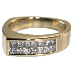 Bague en or jaune 18K avec diamant taille princesse 0.50ct