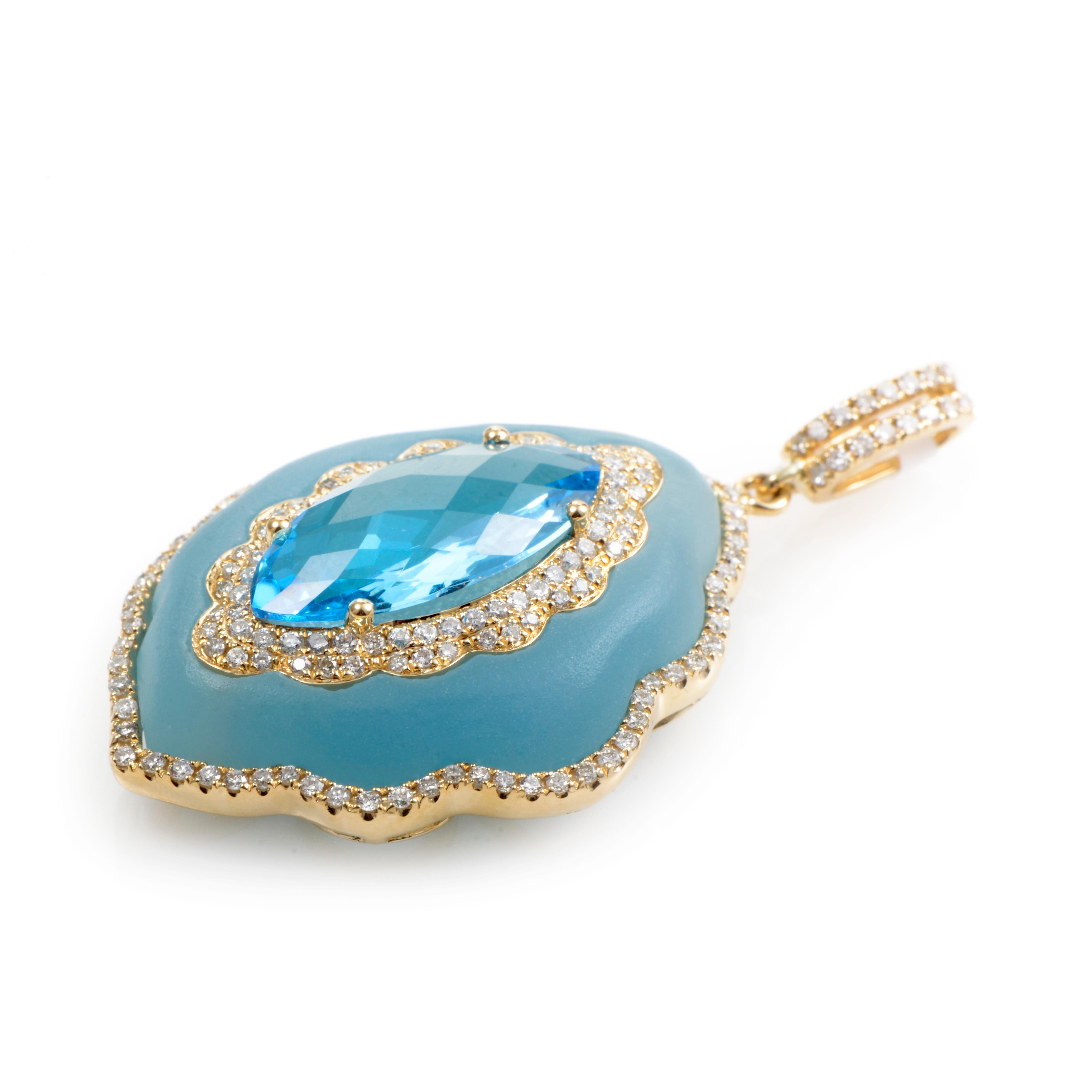 This whimsical pendant shines with a dreamy, blue glow. The pendant is made of 18K yellow gold and is set with ~30.88ct of blue quartz. Lastly, a faceted topaz stone is set in the center of the quartz. Both stones are accented with white diamonds