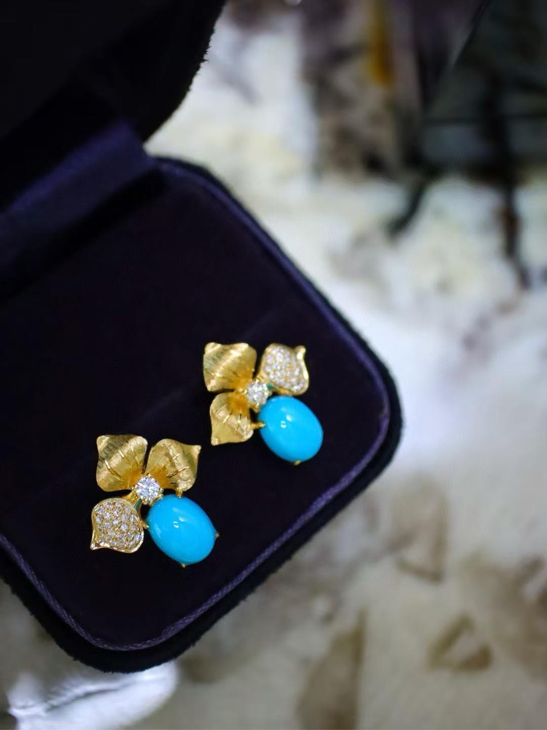 Vibrant Blue Sleeping Beauty Turquoise Diamond 18K Yellow Gold Earrings

High-quality Material: Crafted from 18K yellow gold, providing durability and an elegant luster.

Precious Gemstones: Features genuine Sleeping Beauty turquoise with a vivid