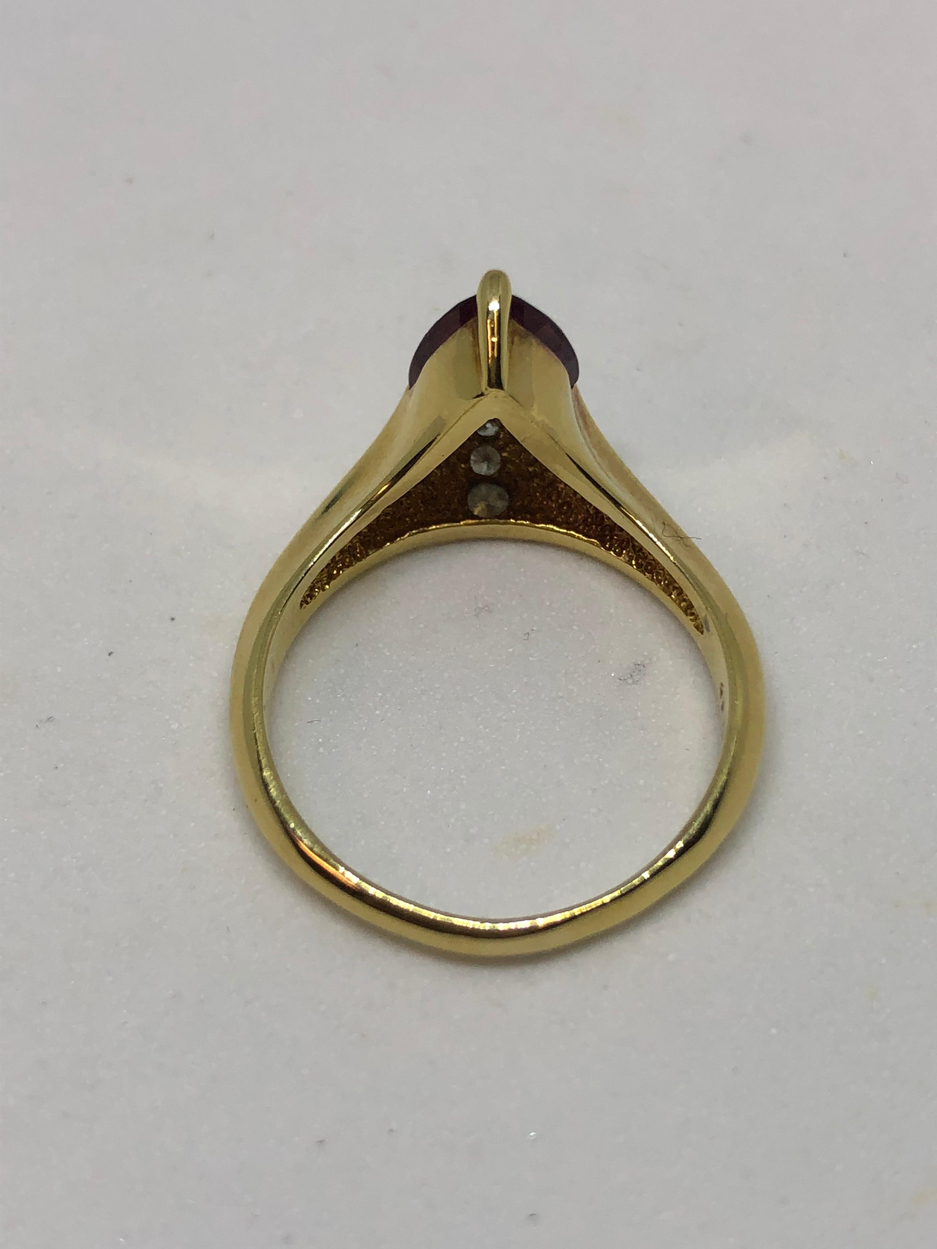 18 Karat Yellow Gold Rhodelite Garnet and Diamond Ring by Jose Trillos In New Condition For Sale In Mansfield, OH