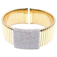 Bracciale a costine in oro giallo 18K con diamanti Brillianti taglio rotondo