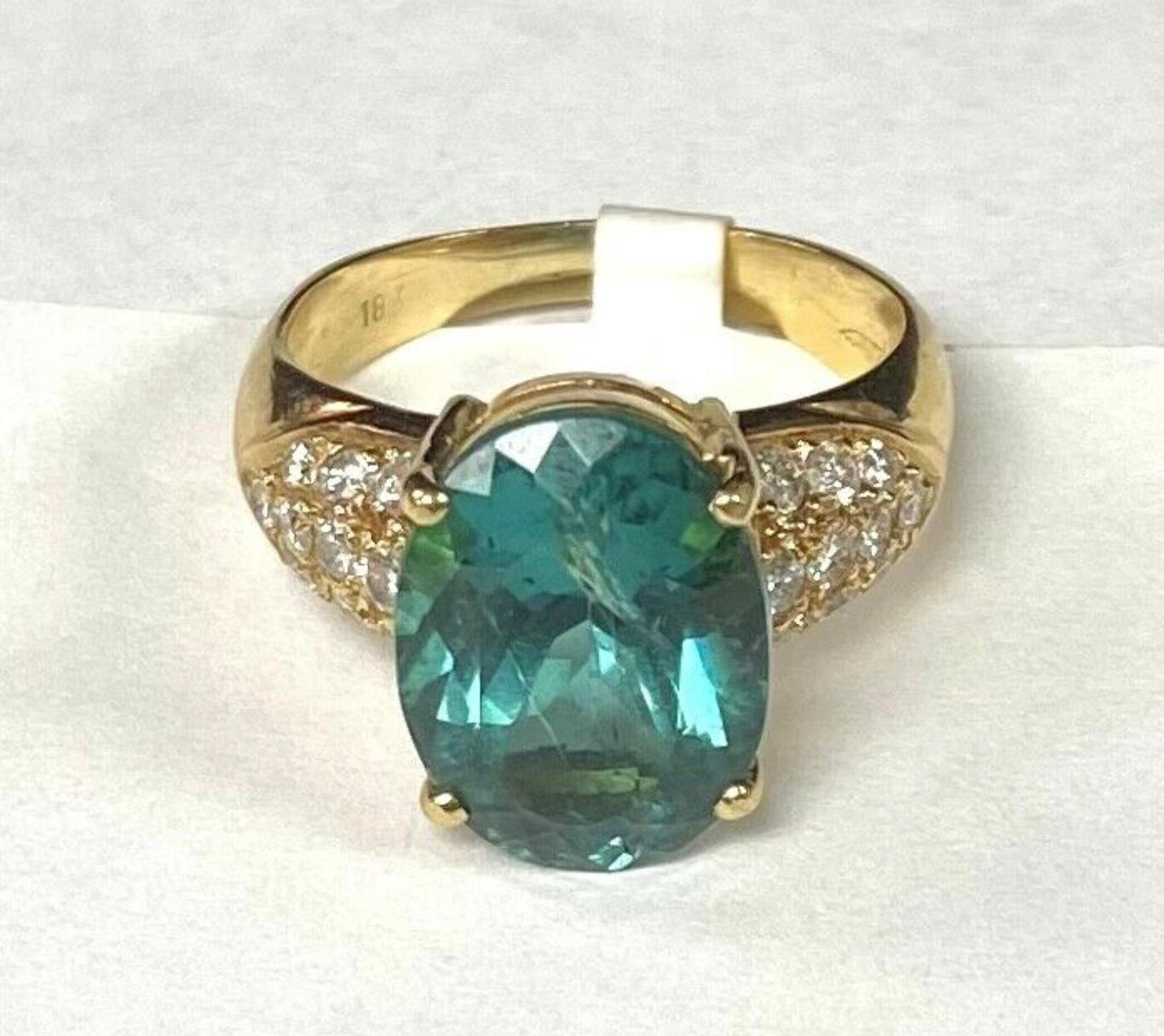 Oval Cut 18K Yellow Gold Ring Green Topaz with Melee of Diamonds For Sale