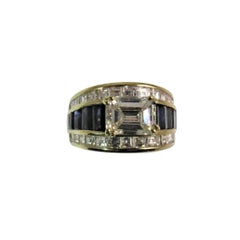 Bague en or jaune 18 carats avec diamant taille émeraude 1,87 carat, diamants et saphirs