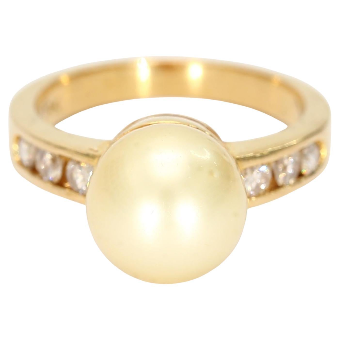 18k Yellow Gold Ring with a Yellow Pearl
Channel Set Diamond Accents - 6.25