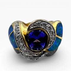 Bague en or jaune 18 carats avec opales australiennes, tanzanites et diamants. (Taille 6.00)