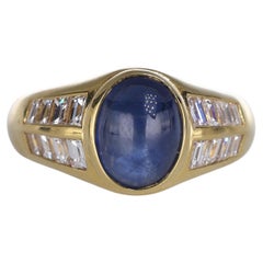 18K Yellow Gold Ring with Cabochon Sapphire and Diamond Baguettes