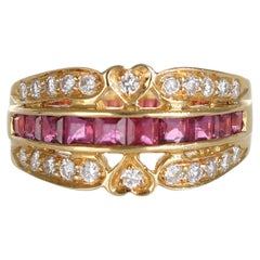 18k Yellow Gold Ring with Carré-Cut Rubies, Diamonds, and Heart Motif