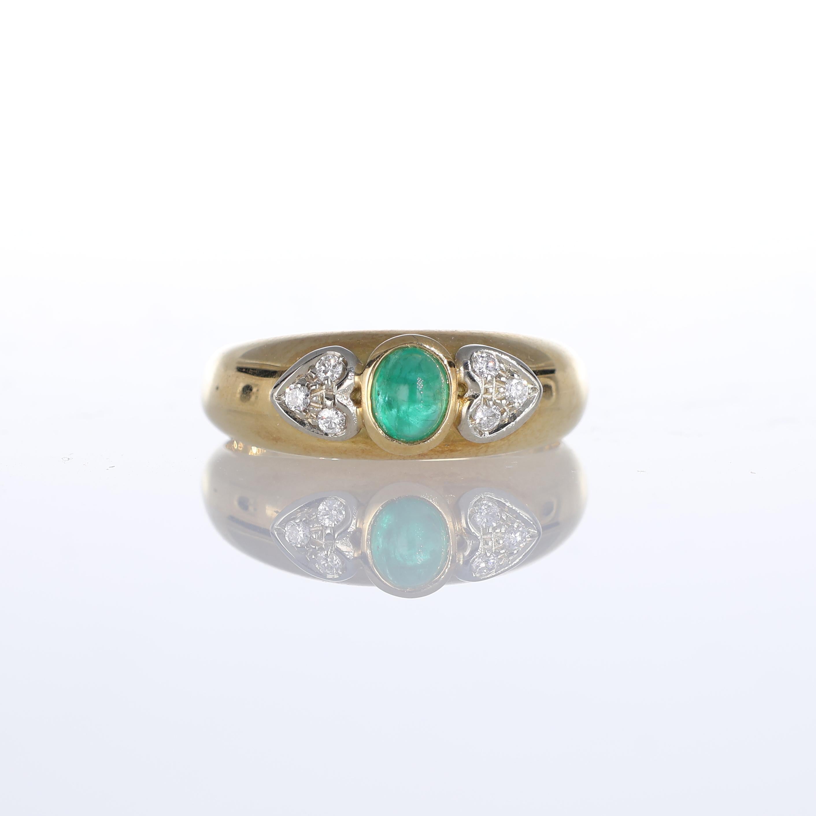 IMPORTANT NOTE:
✔ No additional costs will be added to this order.
✔ Shipping and customs duties are fully covered by us.
--------------------
An elegant 18k yellow gold ring featuring a vibrant emerald cabochon at its center, flanked by two