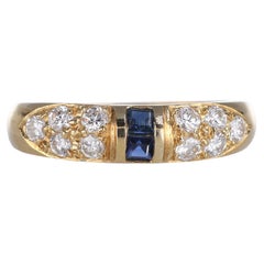 Anello in oro giallo 18k con diamanti e zaffiri