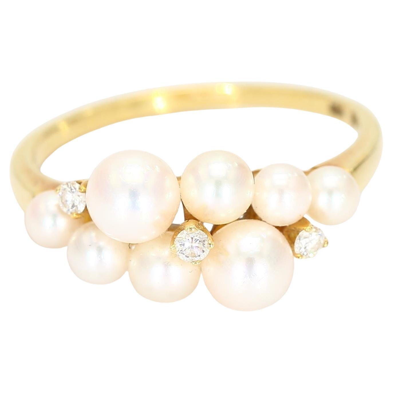 18k Yellow Gold Ring with Eight Pearls
Three Diamond Accents