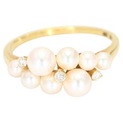 18k Yellow Gold Ring with Eight Pearls
Three Diamond Accents