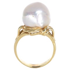 Anello in oro giallo 18K con perla irregolare