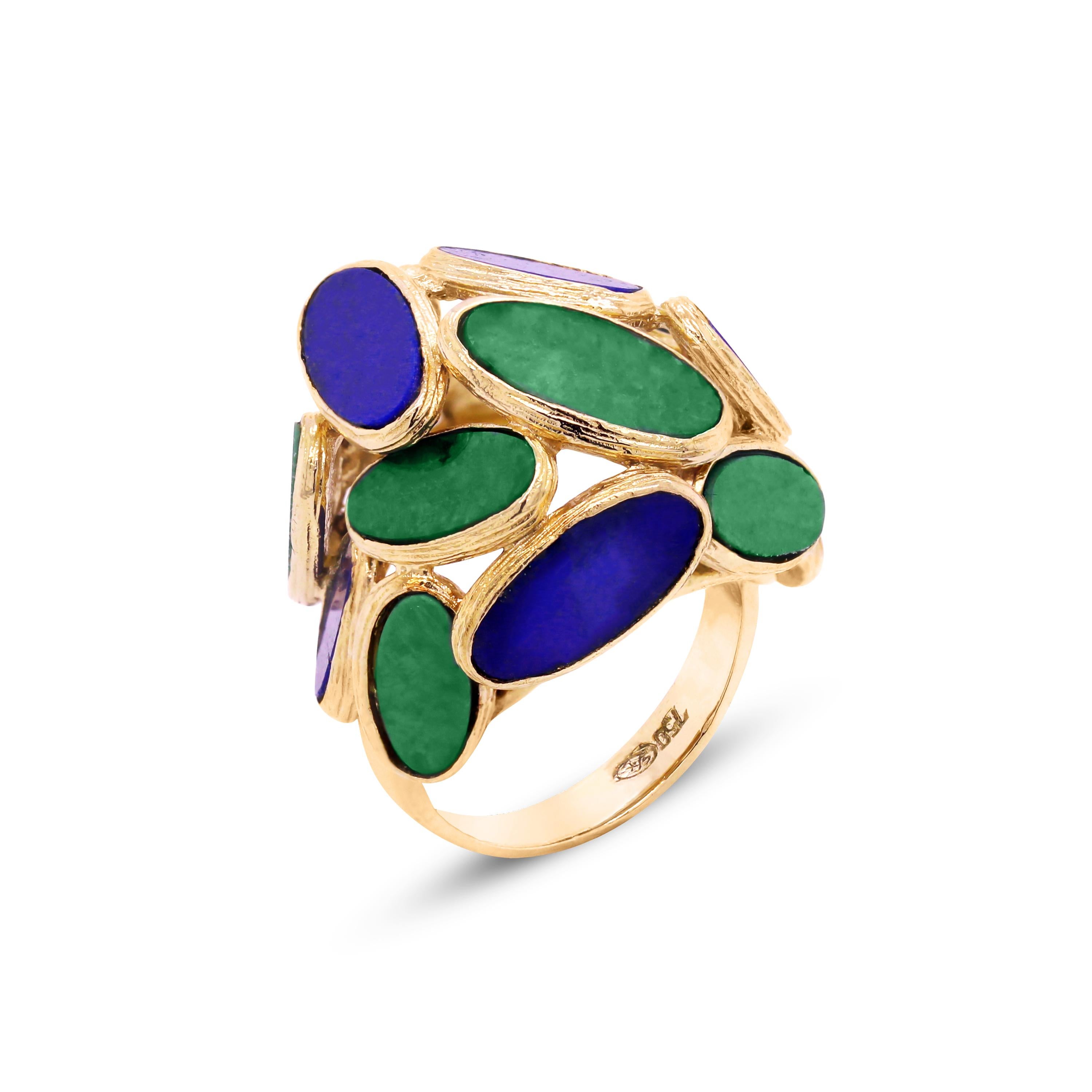 18K Yellow Gold Ring with Oval-Cut Jade and Lapis Lazuli

This fun and unique ring features Jade and Lapis in the centers

Truly beautiful color combination with the greens and blues. The Lapis Lazuli and Jades are very vibrant in color and make for