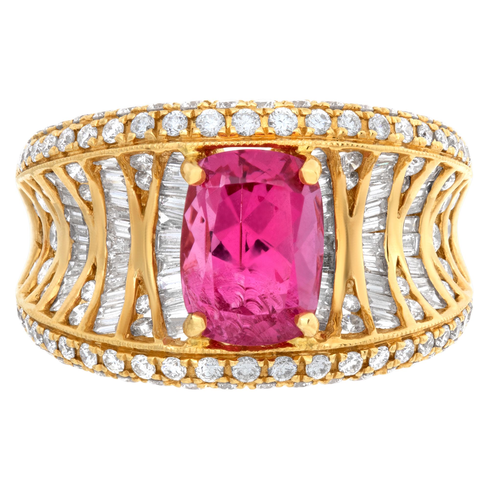 Oval brilliant cut pink spinel (2.73 carats) & diamond ring in 18k yellow gold. Baguette and round brilliant cut diamonds total approximate weight: 1.50 carat, estimate: G-H color, VS clarity. 12mm. Size 6This Diamond ring is currently size 6 and