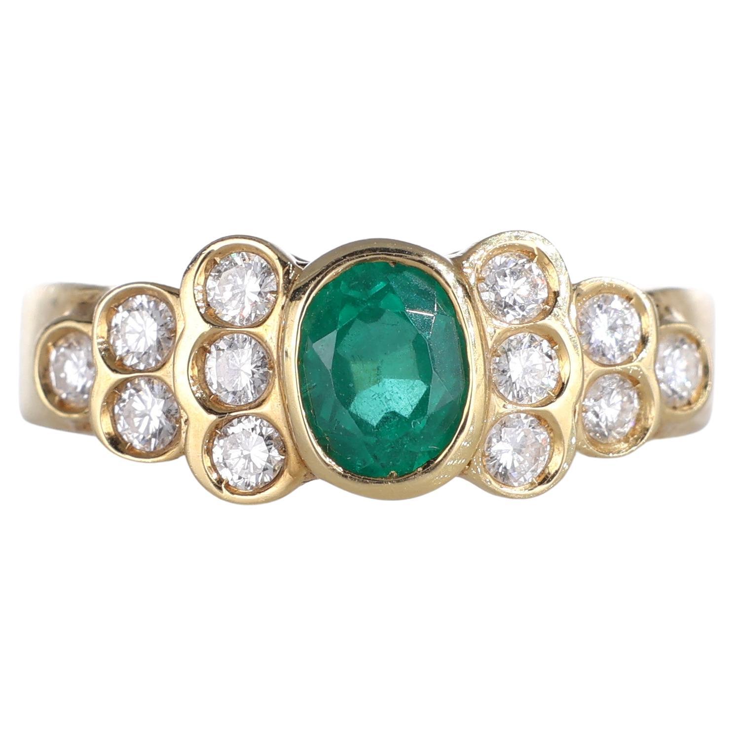 18k Yellow Gold Ring with Oval Emerald and Diamonds