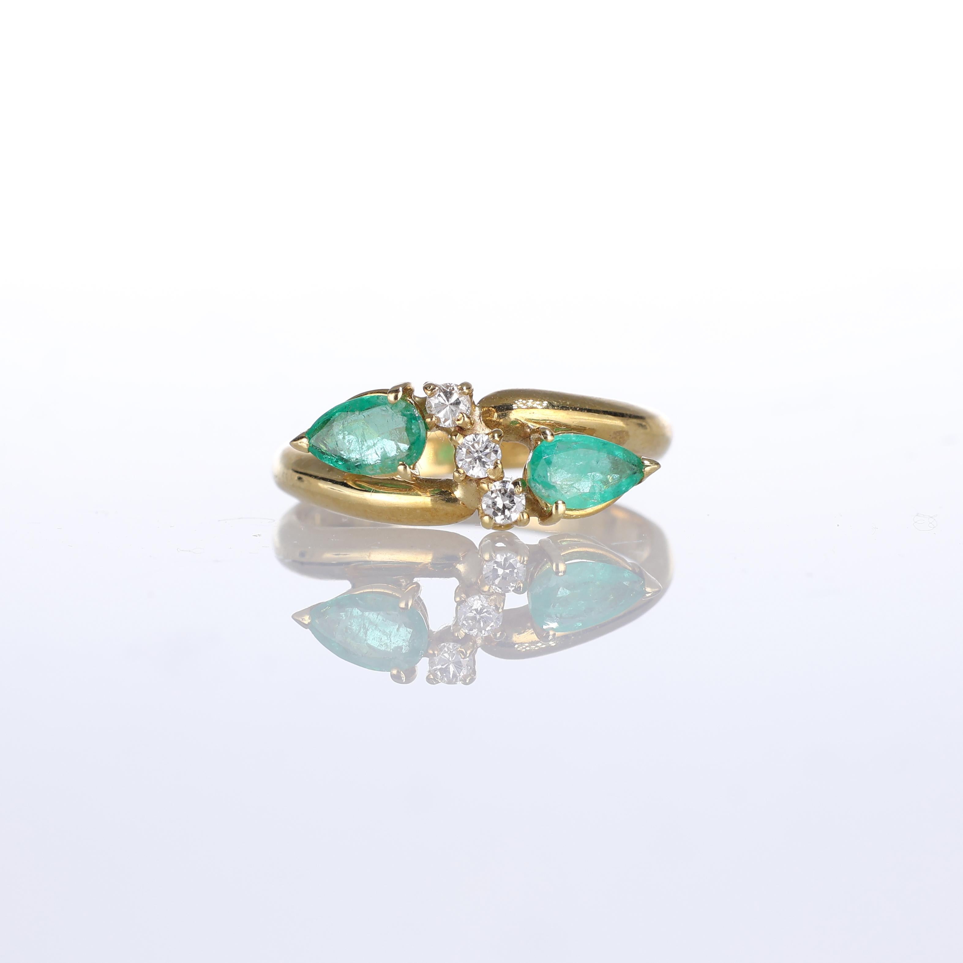IMPORTANT NOTE:
✔ No additional costs will be added to this order.
✔ Shipping and customs duties are fully covered by us.
--------------------
A refined 18k yellow gold ring featuring two vibrant pear-cut emeralds, totaling 0.36 carats, elegantly