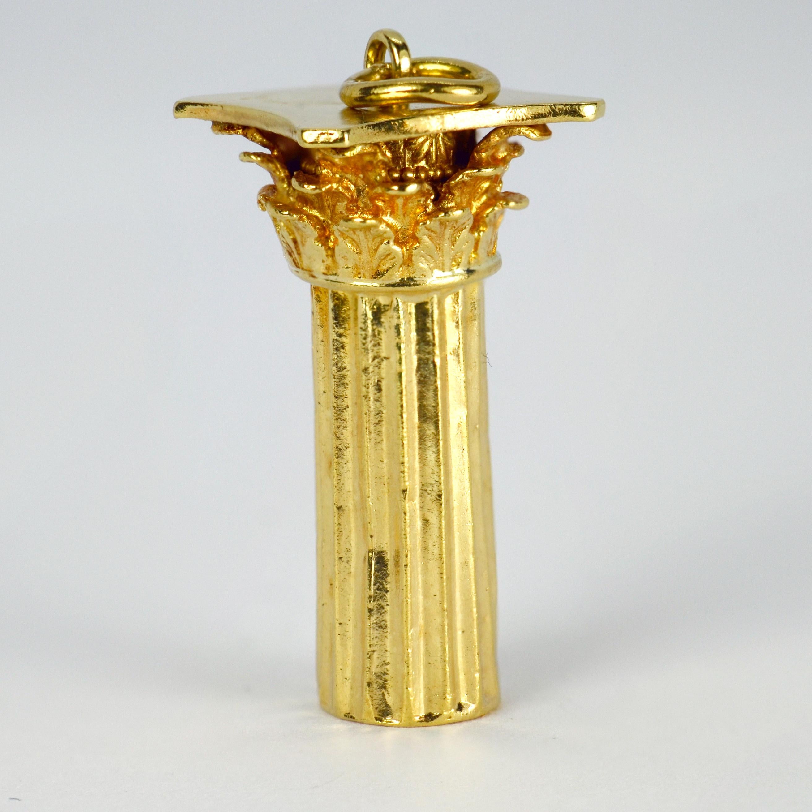 An 18 karat (18K) yellow gold charm pendant designed as an ancient Roman Corinthian column. Stamped K18 for 18 karat gold.

Dimensions: 2.8 x 1.3 x 1.3 cm (not including jump ring)
Weight: 4.06 grams
