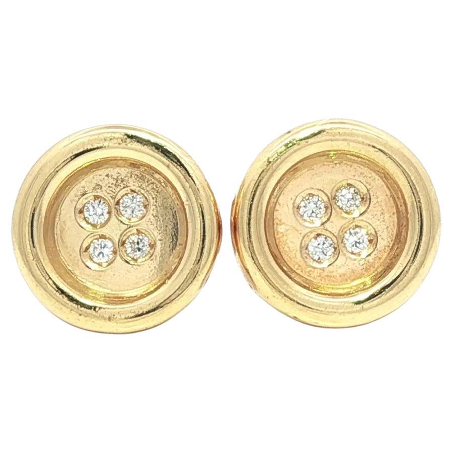Boucles d
oreilles boutons en or jaune 18k avec diamants ronds et polis