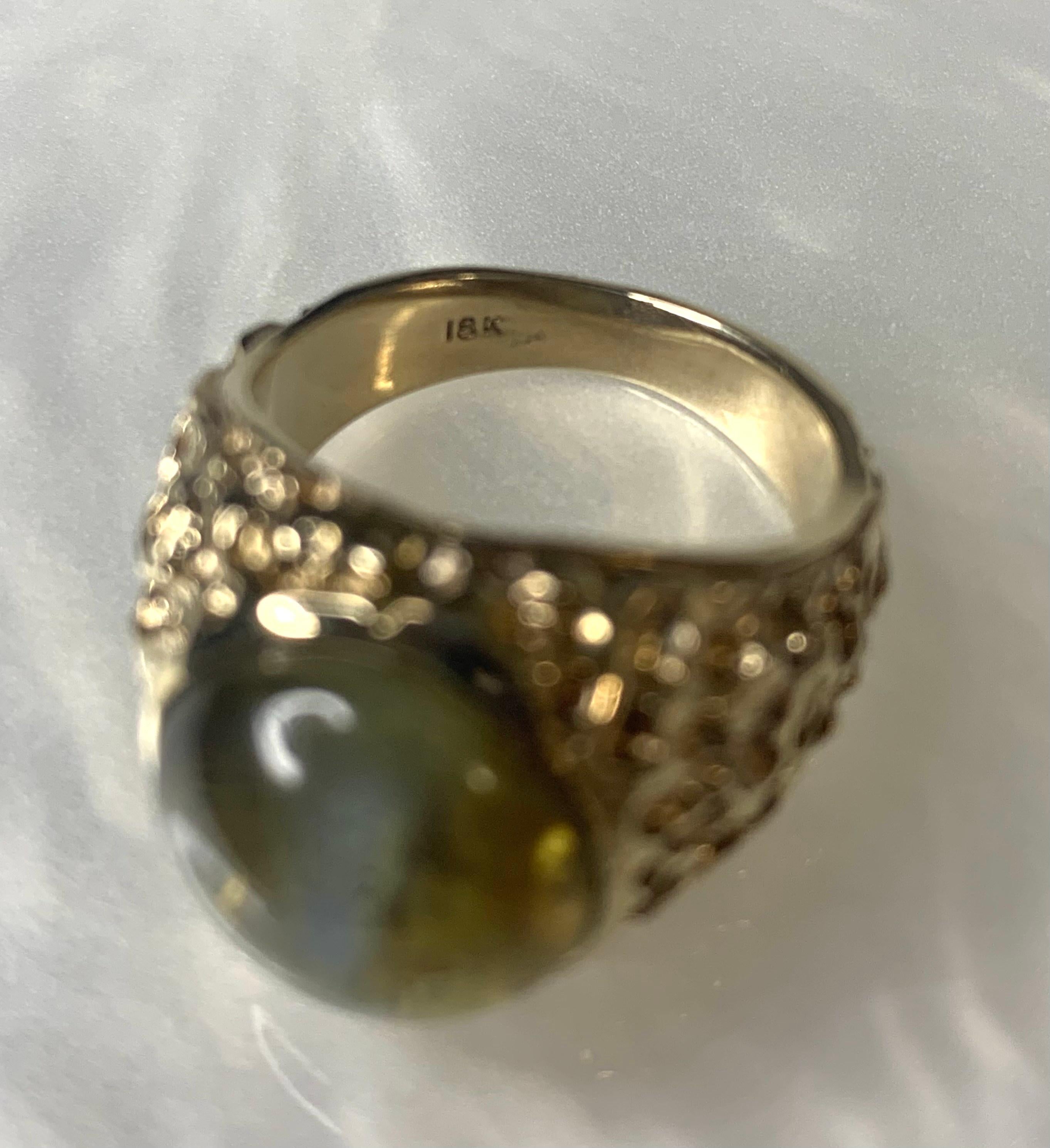 yellow gold cats eye imperial opal