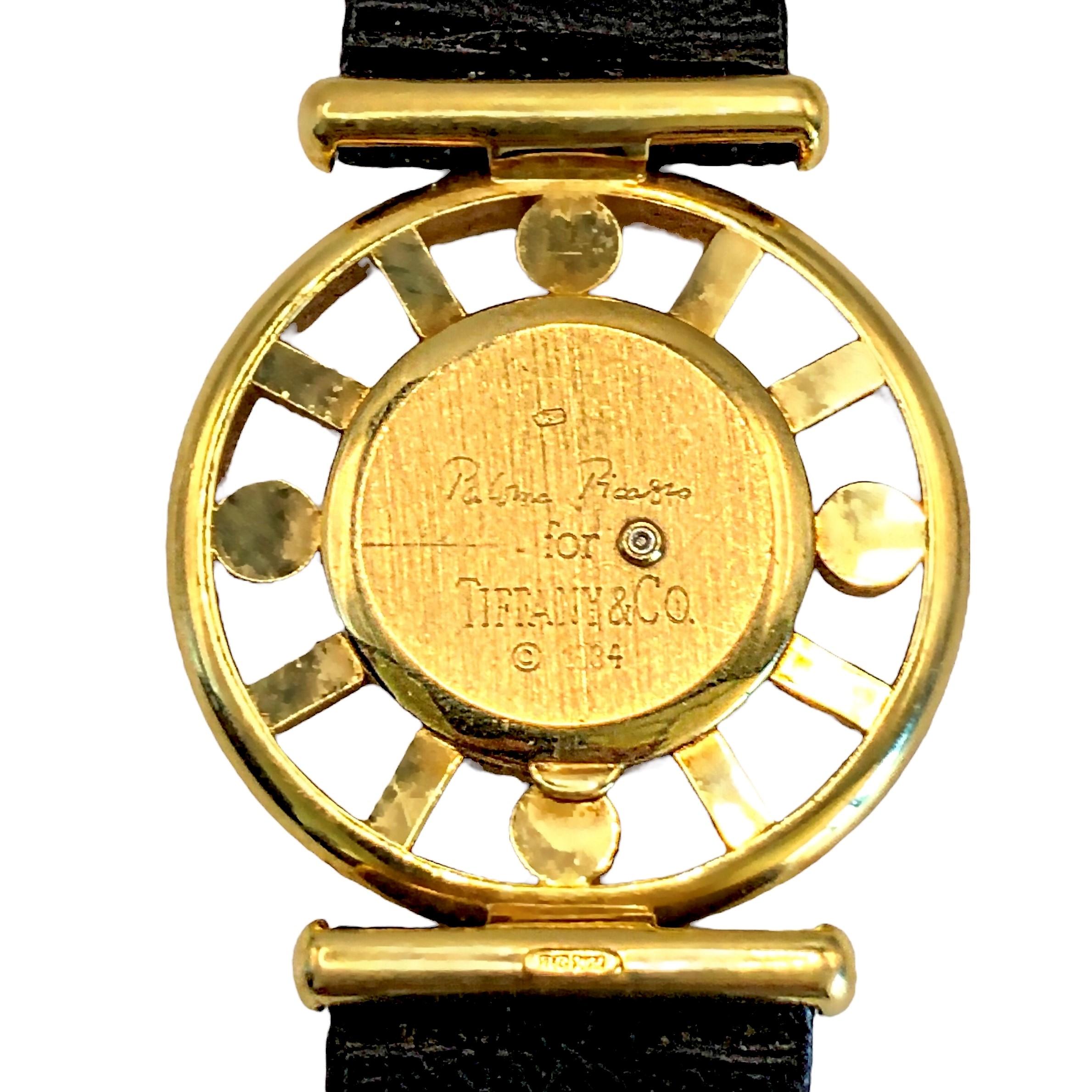 This lovely late 20th Century Tiffany wrist watch is crafted from 18K yellow gold and measures a full 31mm in diameter. The design is edgy and striking as are many Paloma designs. It is signed Paloma Picasso for Tiffany & Co. on the back plate, and