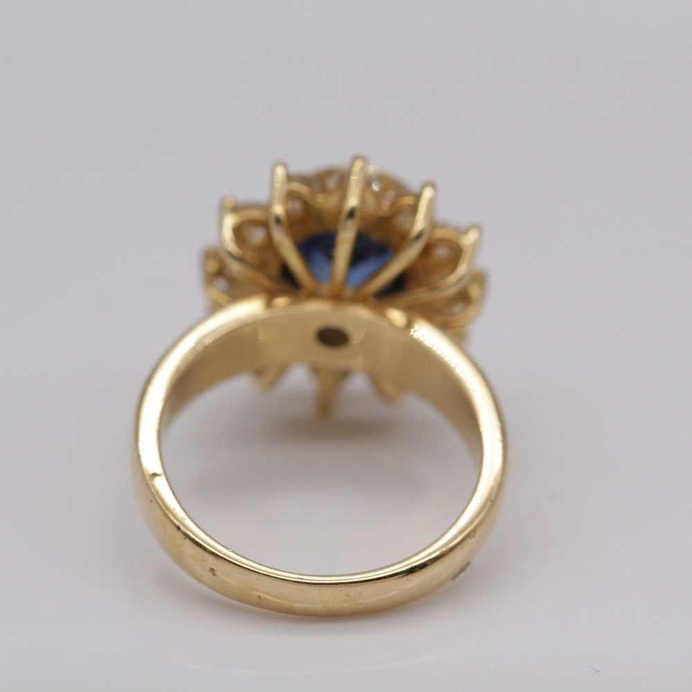 Women's 18K Yellow Gold Royal-Inspired Cluster Ring with Sapphire and Diamonds For Sale