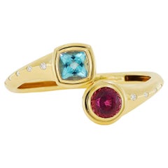 18K Yellow Gold Rubellite and Blue Topaz Bangle Bracelet