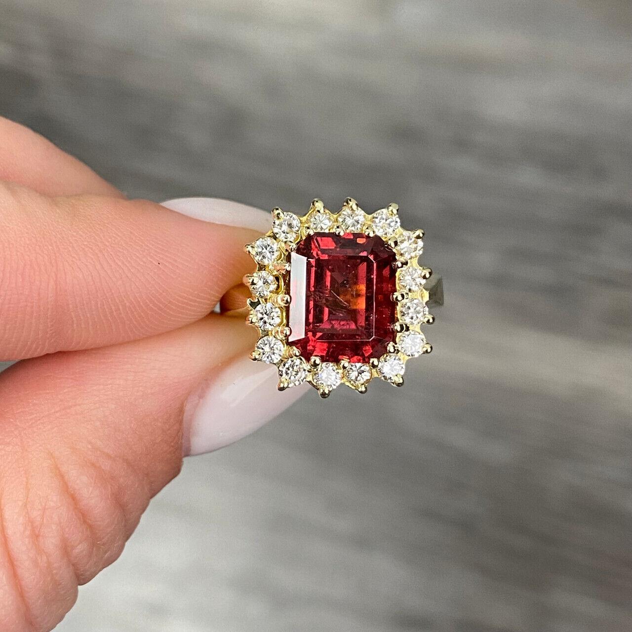 Specifications:
Pre-Owned (Great condition)
Metal: 18K Gold
Weight: 11.1g
Main Stone: 4.25ct Brownish-Red
Side Stones: Approximately 0.96ctw diamonds
Color: H
Clarity: SI1
Size: 5.5 US




