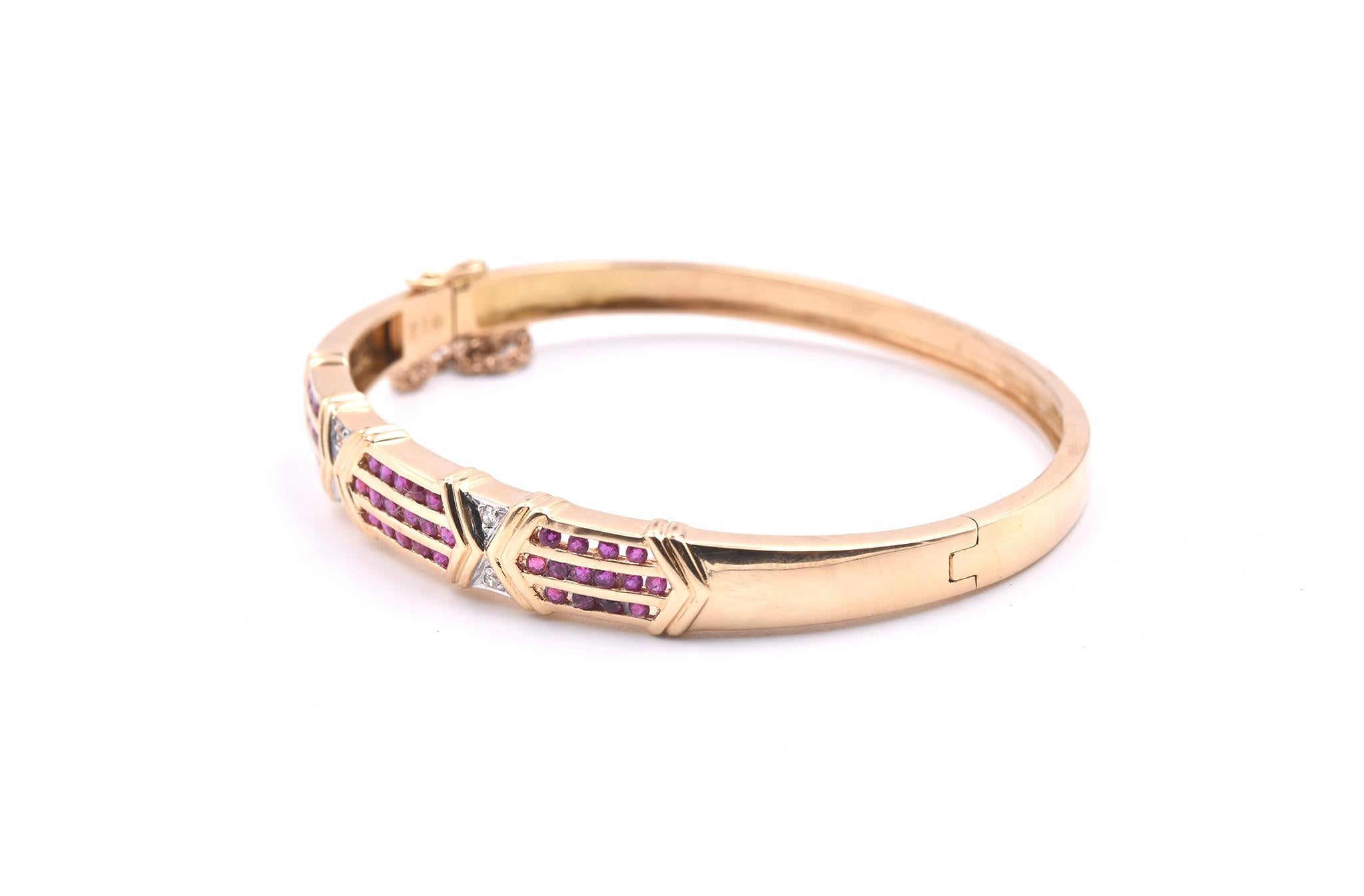 Designer: custom design
Material: 18k yellow gold
Ruby: 44 round cut= .67cttw
Diamonds: 4 round brilliant cut= .04cttw
Color: G
Clarity: VS
Dimensions: bracelet will fit a 6 ½ -inch wrist and it is 8.28mm wide at its widest point 
Weight:  20.37