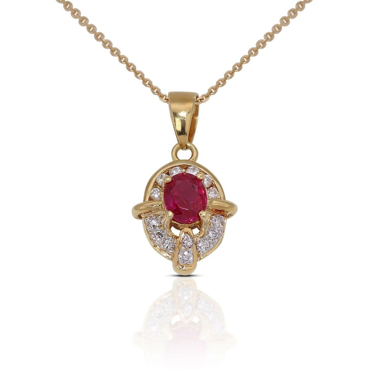 The design of the pendant is both graceful and versatile, making it a perfect accessory for various occasions. The gold setting is crafted with precision, featuring delicate details that add a touch of sophistication to the overall design. The