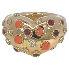 Bague Pinky en or jaune 18K avec rubis et diamants