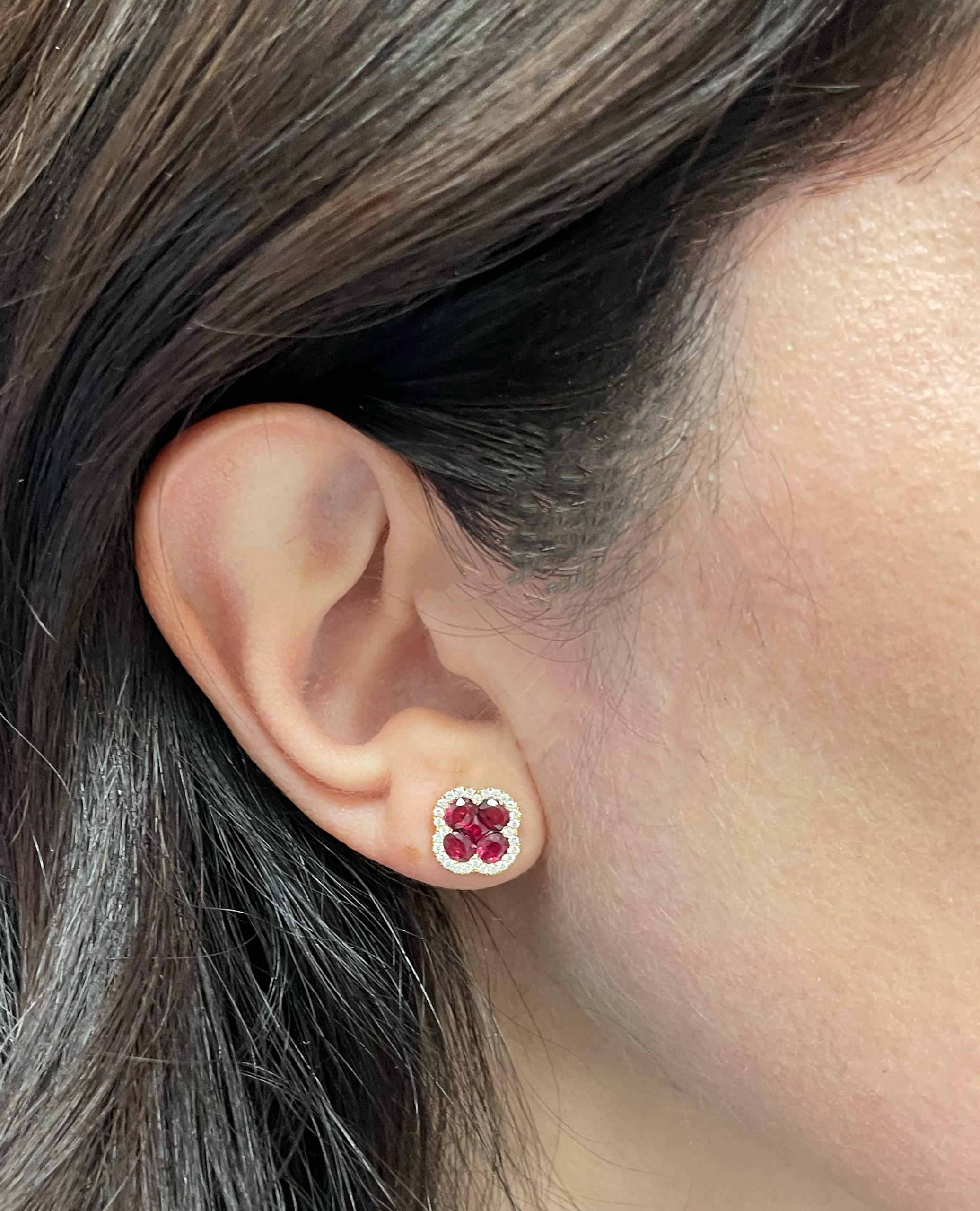 Contemporary 18K Yellow Gold Ruby and Diamond Halo Quatrefoil Post Earrings with Pushbacks For Sale